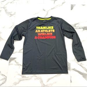 It’s grey long sleeve shit.  Size 18/ 20 (large).  Brand is bcg.